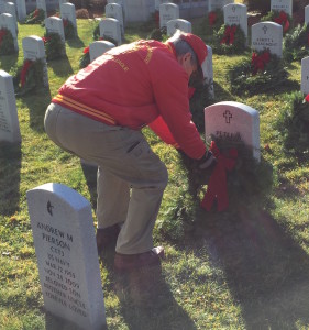 John Finck laying a wreath with Blue Star Mothers.