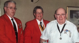 Al, Roy, and Cheryl at the Joint Installation where Al receives award for building the Iwo Jima Float.